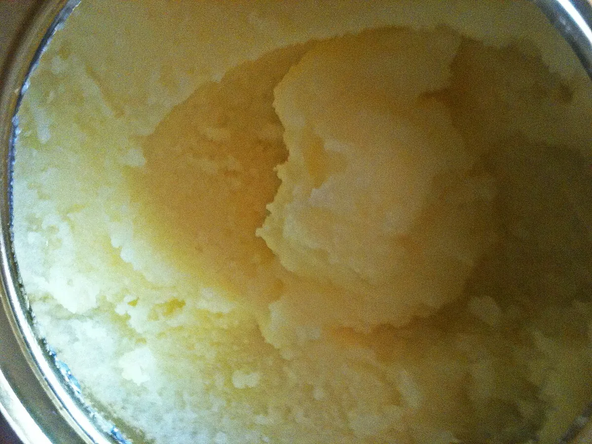 Jar of golden pure desi ghee with ghee benefits